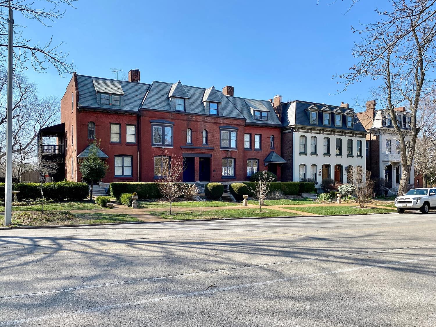 An 1891 row of red brick Queen Anne houses on Missouri Avenue in the Lafayette Square Historic District of St. Louis
