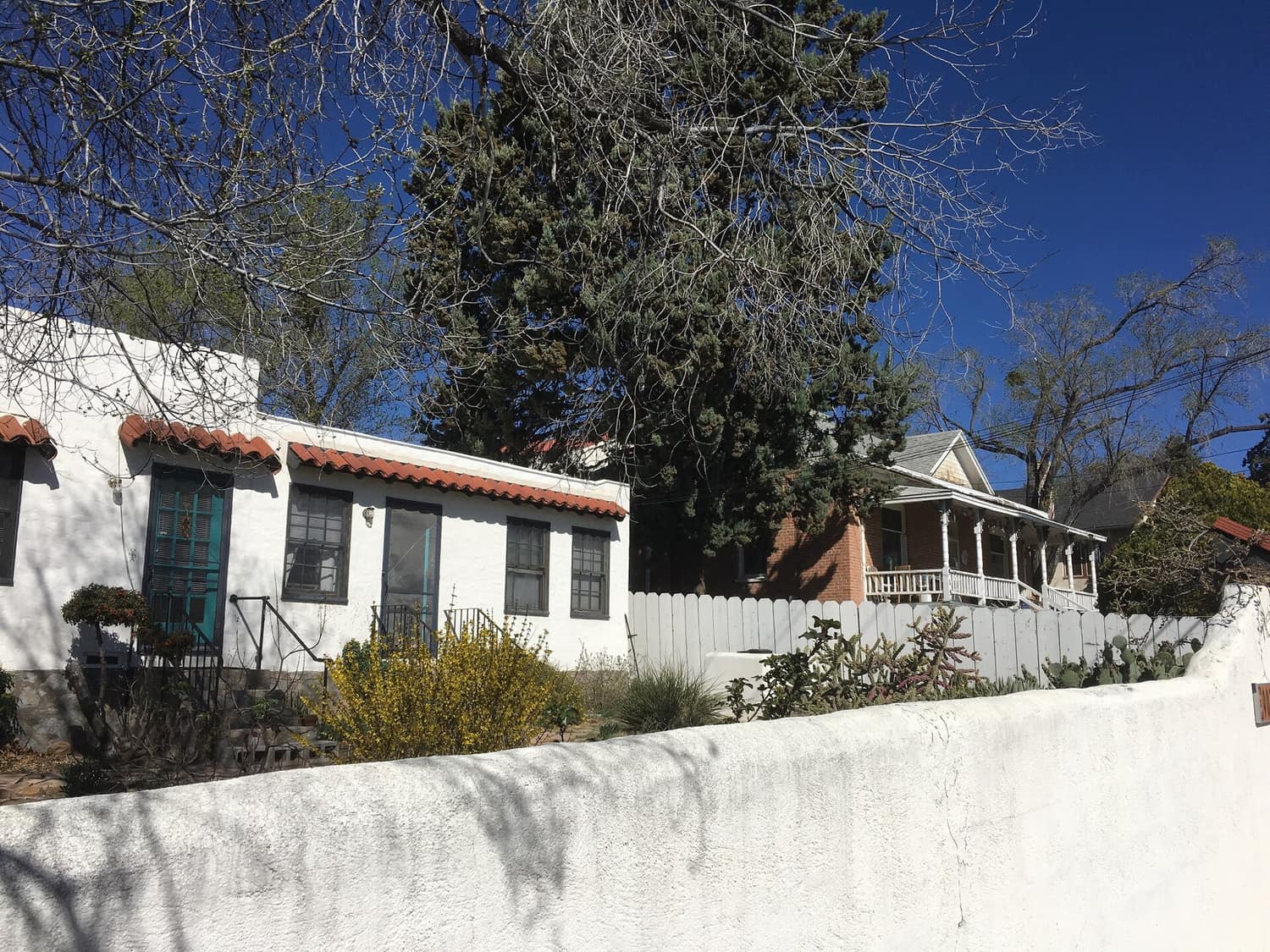 Wood-frame and stucco houses on the 900 block of West Street in the North Addition historic district of Silver City, New Mexico