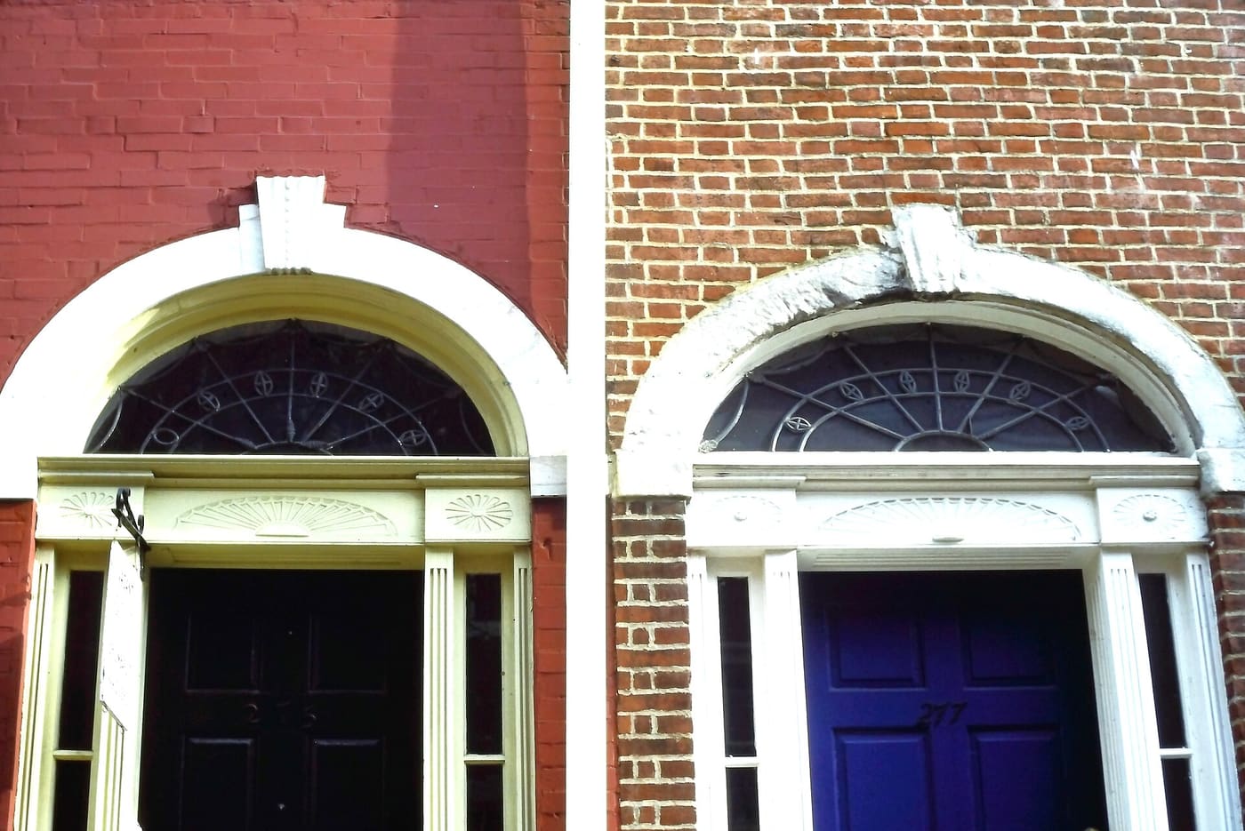 A row of Federal-style brick row houses in the Society Hill neighborhood of Philadelphia